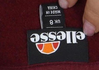 Close-up detail of Ellesse Women's Red Pullover Hoodie, size 8