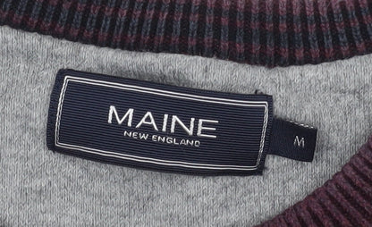 Brand and care label for Maine New England Men's Purple Cotton jumper M