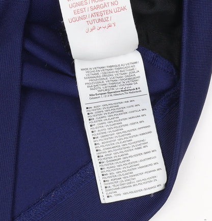 Close-up detail of Nike boys’ blue track jacket xs - lightweight activewear