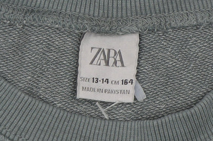 Close-up detail of Zara boys’ green crew neck pullover sweatshirt 13-14 years