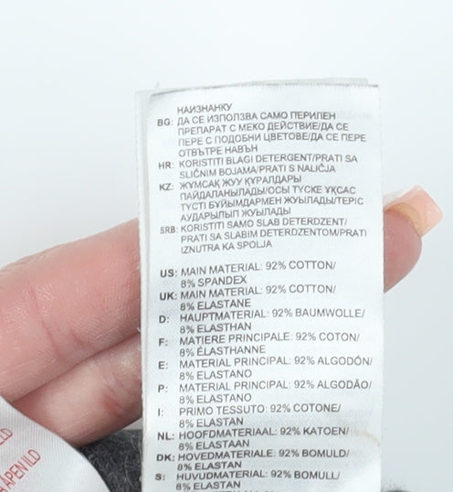 Close-up detail of Adidas girls’ grey ankle leggings, size 4-5y elastic waist
