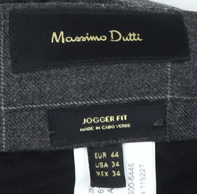 Close-up detail of Massimo Dutti Men's Grey Check Jogger Trousers, size 34