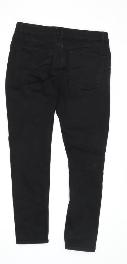 Back view of ASOS men’s black skinny jeans, size 32, regular