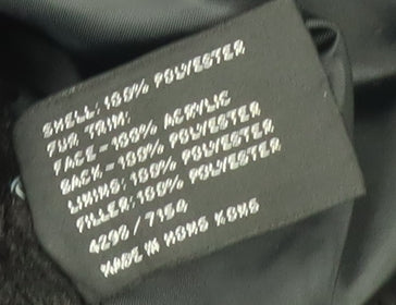 Close-up detail of Nuage Women's Black Overcoat, size 12, with Fur Trim