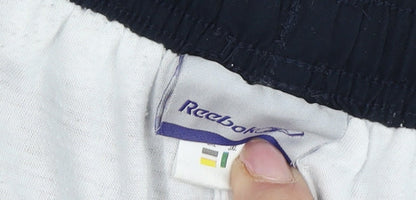 Brand and care label for Reebok boys’ black track pants jxl elastic waist sports