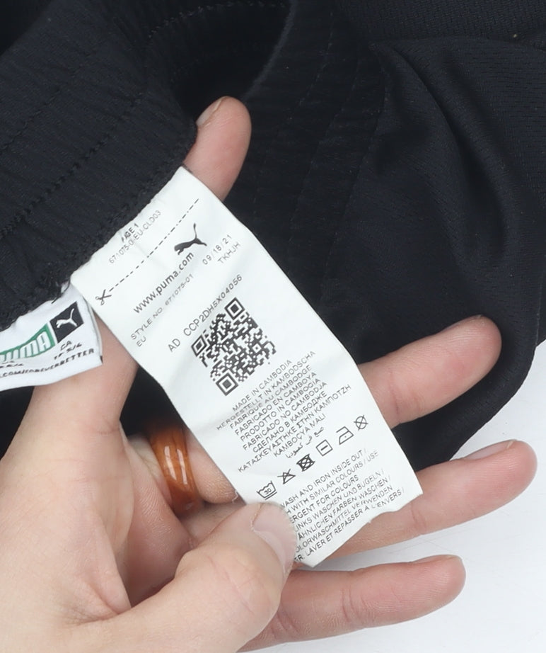 Brand and care label for Puma boys’ black athletic shorts xs