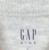 Close-up detail of Gap girls’ grey long sleeve sequin t-shirt 6-7 years casual