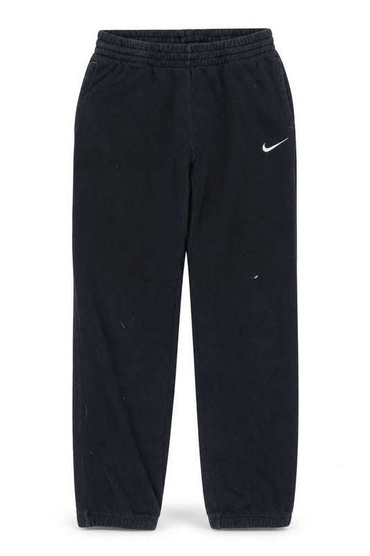 Front view of Nike boys’ xl black track pants - sporty style & comfort