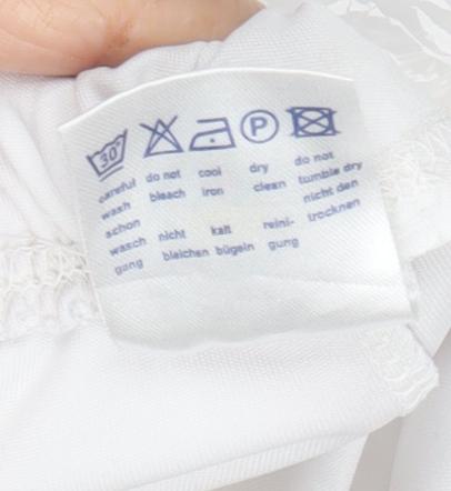 Close-up detail of boys’ white athletic football shorts, size 164