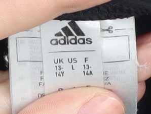 Brand and care label for Adidas girls’ black one piece swimsuit 13-14y athletic