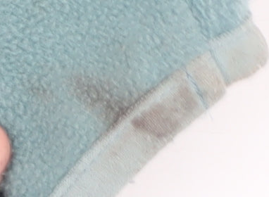 Close-up detail of Rukka boys’ blue full zip hoodie - 4 years