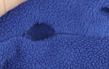 Close-up detail of Trespass boys’ blue fleece 1/4 zip sweatshirt, 9-10 years