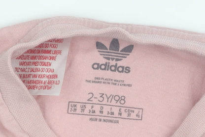 Close-up detail of Adidas girls’ pink t-shirt, 2-3 years, casual and comfy