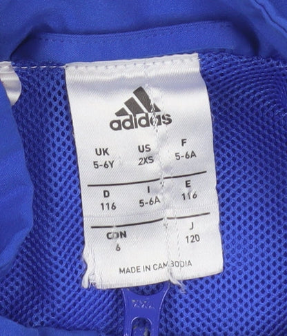 Close-up detail of Adidas boys’ blue track jacket 5-6 years full zip