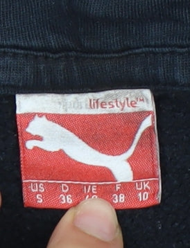 Close-up detail of Puma boys’ black hoodie pullover uk 10