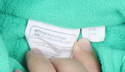 Close-up detail of Mountain Warehouse boys’' green fleece sweatshirt xs