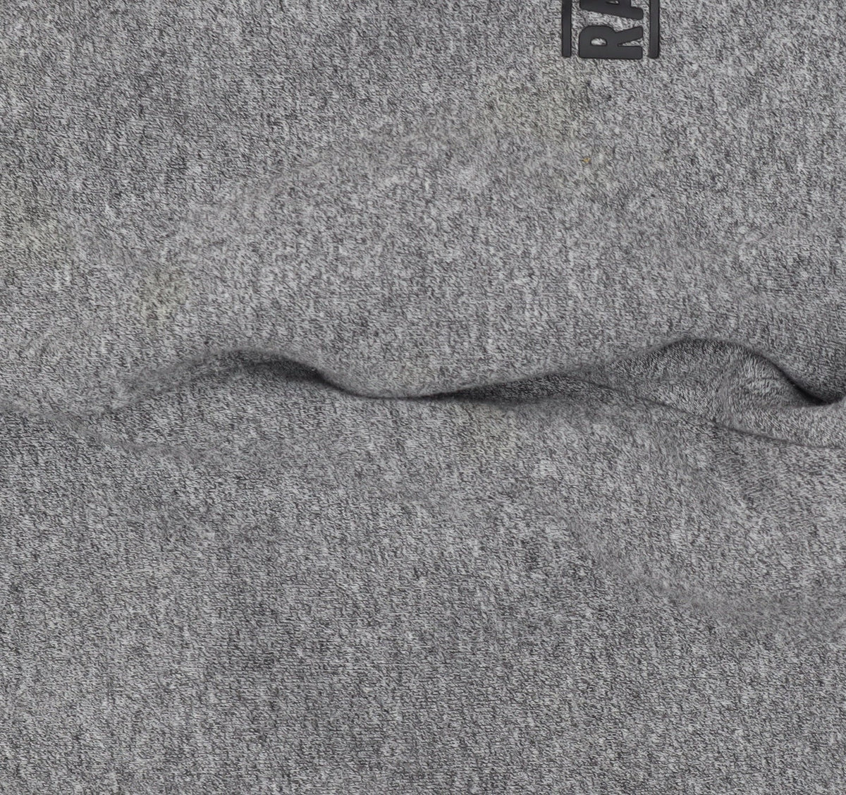 Close-up detail of Rascal boys’ grey jogger trousers, size L, elastic waist