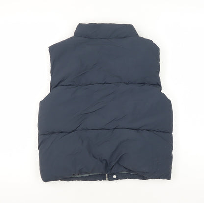 Back view of Zara girls’ blue puffer jacket 8-9 years