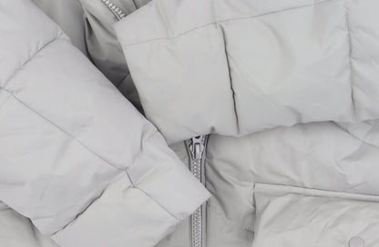 Close-up detail of ASOS DESIGN Women’s Green Puffer Jacket, size UK 38