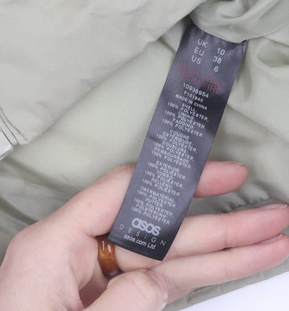 Brand and care label for ASOS DESIGN Women’s Green Puffer Jacket, size UK 38