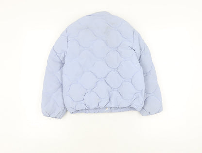 Back view of Zara girls’ blue quilted jacket 8 years lined winter