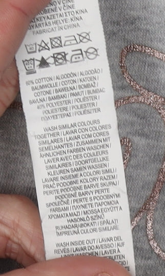 Brand and care label for Pineapple girls’ grey hoodie pullover 9-10 years embroidered