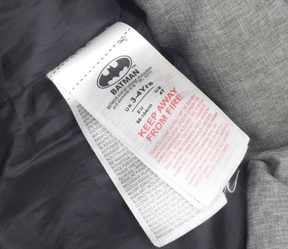 Close-up detail of boys’ grey batman puffer jacket 3-4 years hooded winter