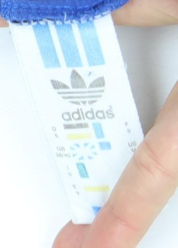 Close-up detail of Adidas Men's Blue Graphic Logo T-Shirt