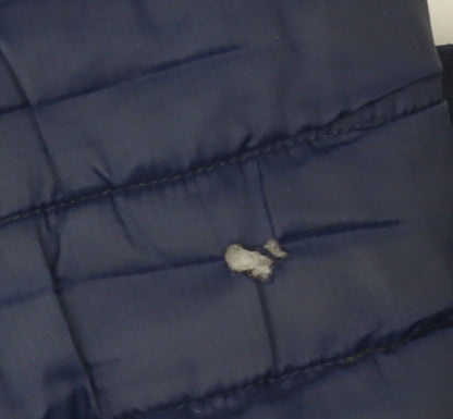 Close-up detail of Decathlon girls’ blue hooded puffer jacket 12-13 years