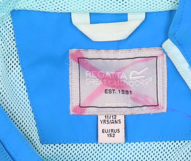 Close-up detail of Regatta boys’ blue waterproof jacket 11-12 years hooded