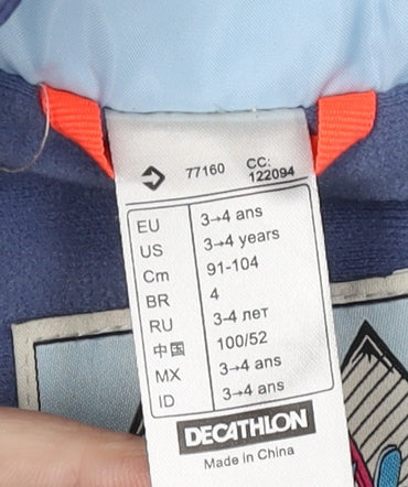 Close-up detail of Decathlon girls’' blue parka jacket 3-4 years waterproof