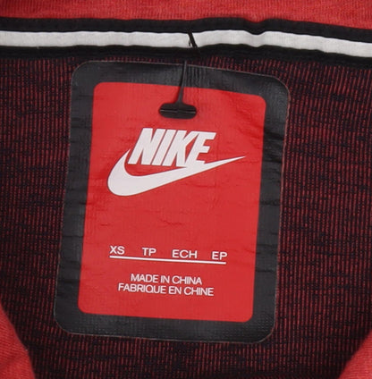 Close-up detail of Nike boys’ red pullover hoodie xs sporty logo design