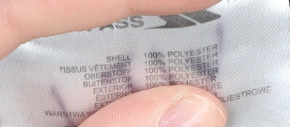 Close-up detail of Trespass boys’ black fleece jacket, size 9-10, years