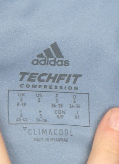 Brand and care label for Adidas Women's Blue Compression Leggings S for Gym