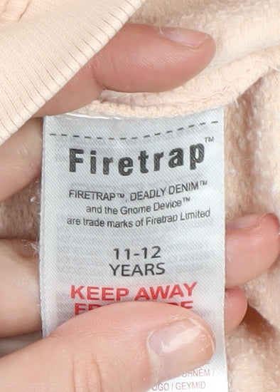 Brand and care label for Firetrap girls’ beige hoodie 11-12 years pullover casual