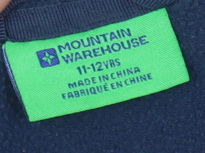 Close-up detail of Mountain Warehouse boys’ blue fleece jacket 11-12 years