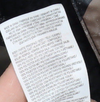 Close-up detail of Firetrap boys’ camouflage rain coat 2-3 years