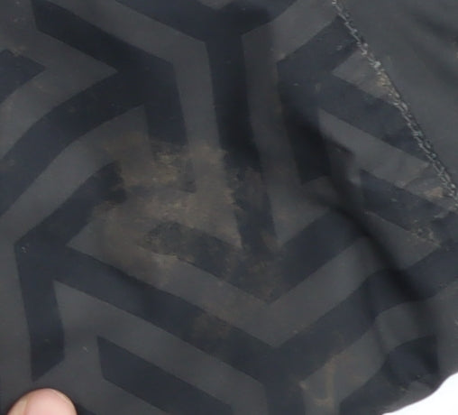 Close-up detail of Trespass boys’ black puffer jacket 7-8 years waterproof
