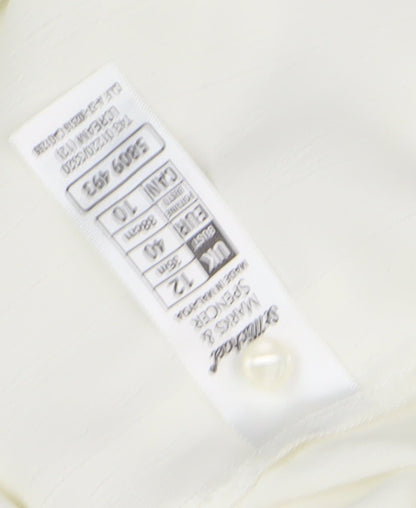 Close-up detail of Marks & Spencer Ivory Collared Button-Up Shirt