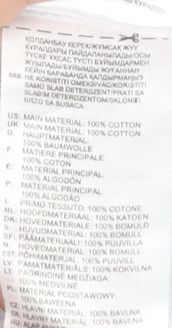 Brand and care label for Adidas boys’ white t-shirt, size 11-12, casual basic tee