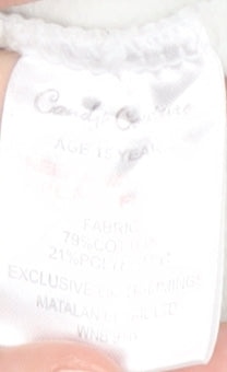 Brand and care label for Candy Couture girls’ white pullover sweatshirt, size 15