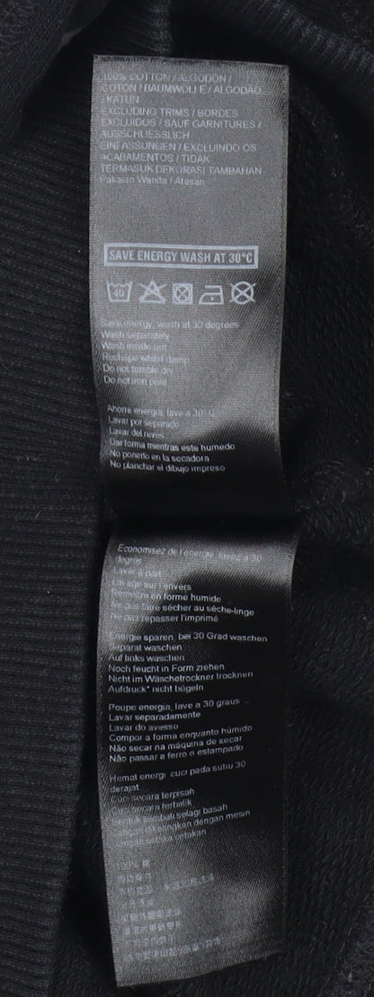 Close-up detail of Ivy Park Women's Black Hooded jumper