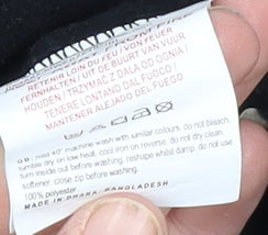 Close-up detail of Mountain Warehouse girls’ black fleece pullover, 8 years