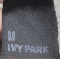 Close-up detail of Ivy Park Women's Grey Cropped Hoodie - Medium