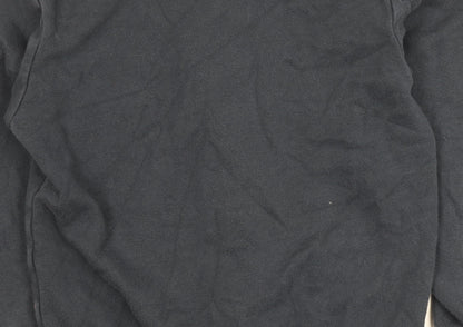 Close-up detail of Converse boys’ black hooded jacket, size 10-12, full zip, casual
