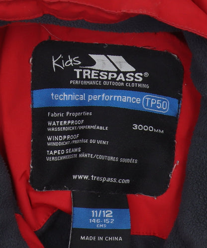 Brand and care label for Trespass boys’ red waterproof rain coat 11 years - winter jacket