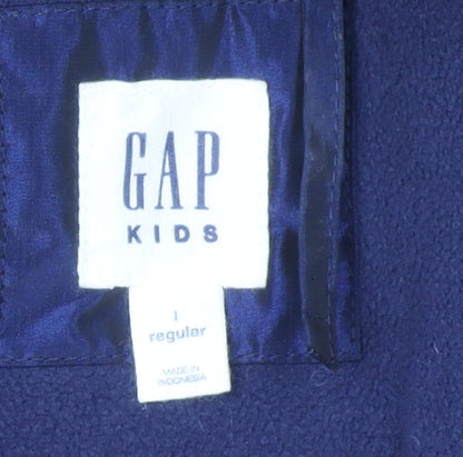 Close-up detail of Gap girls’ blue puffer jacket 11 years winter hooded