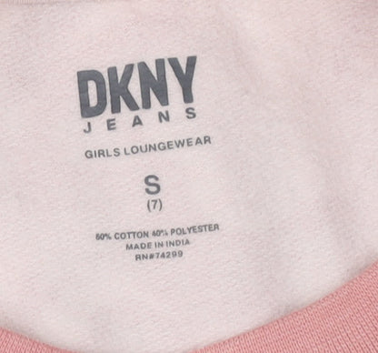 Close-up detail of DKNY girls’ pink heart sweatshirt -, size S, casual style
