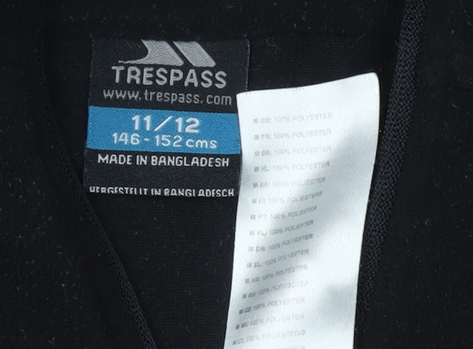 Close-up detail of Trespass boys’ black 1/2 zip fleece sweatshirt 11 years