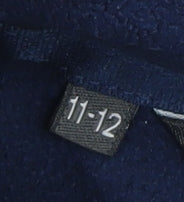 Brand and care label for Hi Gear boys’ blue basic jacket 11-12 years